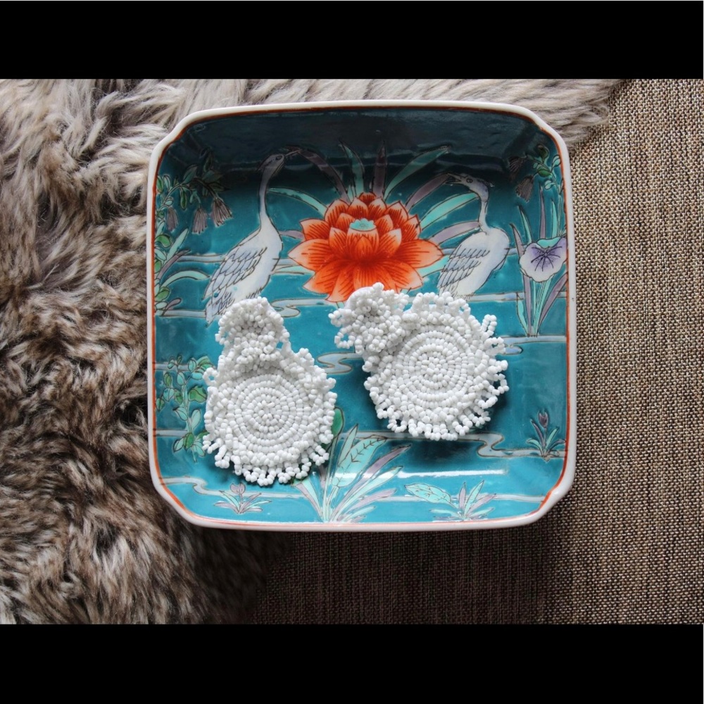 White beaded earrings